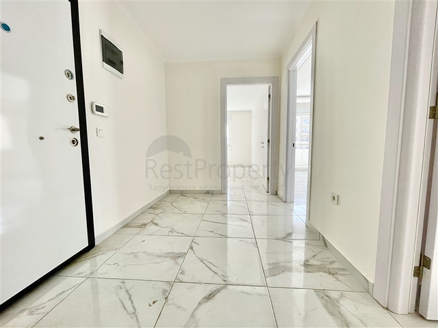 شقة جديدة - غرفتين وصالة - ضمن مجمع - في محمودلار / الانيا 