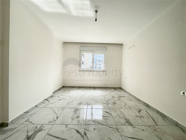 شقة جديدة - غرفتين وصالة - ضمن مجمع - في محمودلار / الانيا 