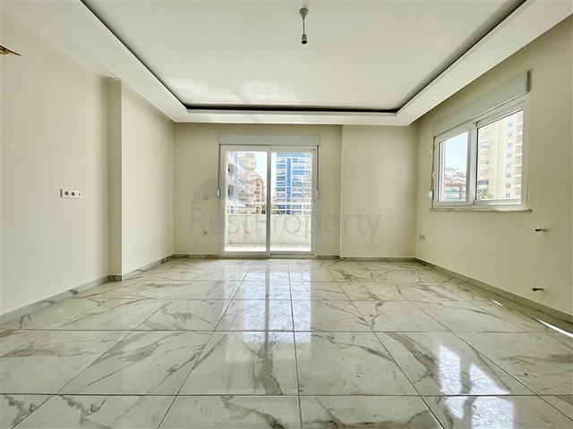 شقة جديدة - غرفتين وصالة - ضمن مجمع - في محمودلار / الانيا 