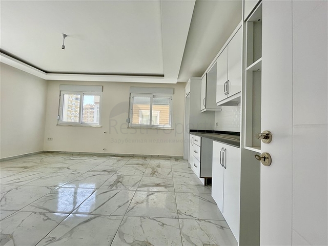 شقة جديدة - غرفتين وصالة - ضمن مجمع - في محمودلار / الانيا 