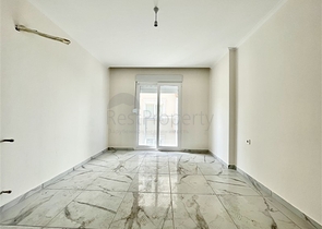 شقة جديدة - غرفتين وصالة - ضمن مجمع - في محمودلار / الانيا 