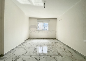 شقة جديدة - غرفتين وصالة - ضمن مجمع - في محمودلار / الانيا 