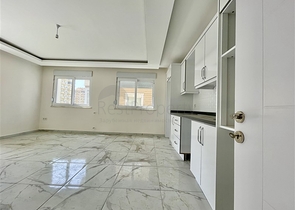 شقة جديدة - غرفتين وصالة - ضمن مجمع - في محمودلار / الانيا 