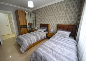 شقة زاوية - غرفتين وصالة مفروشة - في محمودلار / الانيا 