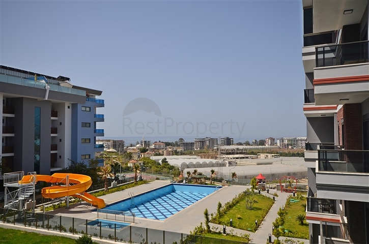 دوبلكس ارضية - 4 غرف وصالة مفروشة - مجمع حديث - في كارجيجاك / الانيا 