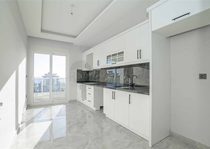 اطلالة بحر - مطبخ منفصل -شقة غرفتين وصالة -ضمن مجمع حديث - في محمودلار / الانيا 