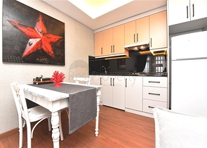 موقع مركزي - شقة غرفة وصالة مفروشة  -في اوبا / الانيا 