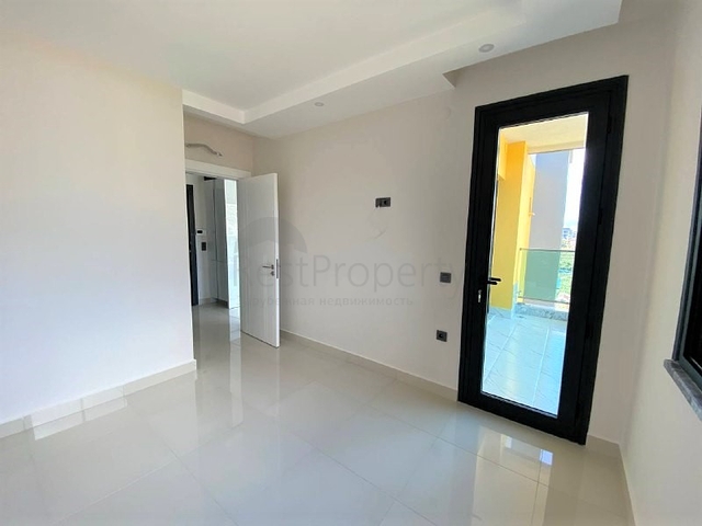 اطلالة على جبال طوروس - شقة غرفة وصالة - مجمع حديث - في محمودلار / الانيا 