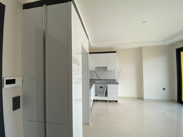 اطلالة على جبال طوروس - شقة غرفة وصالة - مجمع حديث - في محمودلار / الانيا 