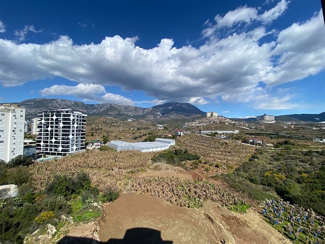 اطلالة على جبال طوروس - شقة غرفة وصالة - مجمع حديث - في محمودلار / الانيا 