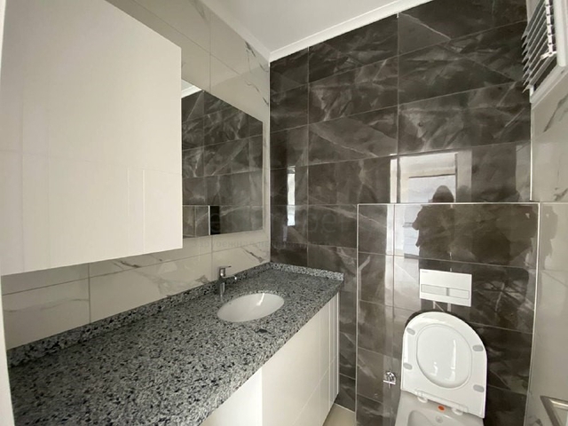 اطلالة على جبال طوروس - شقة غرفة وصالة - مجمع حديث - في محمودلار / الانيا 