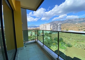 اطلالة على جبال طوروس - شقة غرفة وصالة - مجمع حديث - في محمودلار / الانيا 