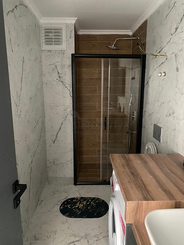 اطلالة مفتوحة - شقة غرفة وصالة جديدة -ضمن مجمع سكني - في محمودلار / الانيا 