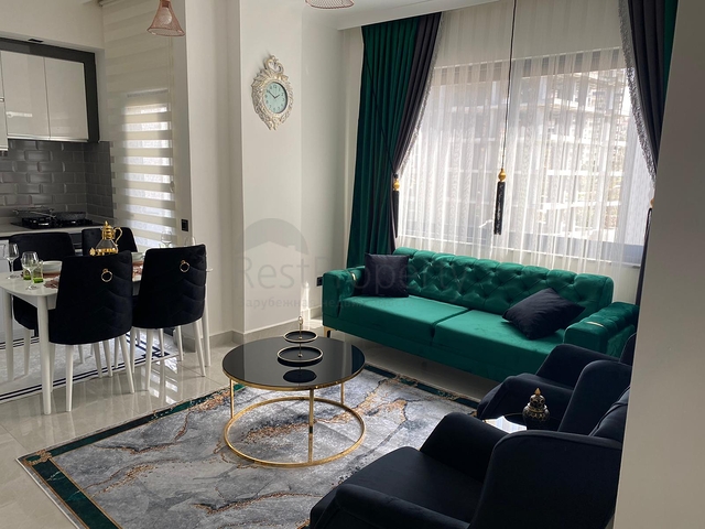 اطلالة مفتوحة - شقة غرفة وصالة جديدة -ضمن مجمع سكني - في محمودلار / الانيا 