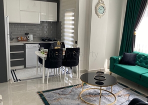 اطلالة مفتوحة - شقة غرفة وصالة جديدة -ضمن مجمع سكني - في محمودلار / الانيا 