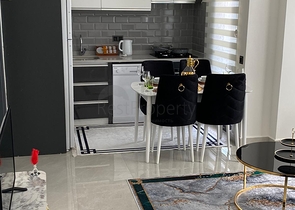 اطلالة مفتوحة - شقة غرفة وصالة جديدة -ضمن مجمع سكني - في محمودلار / الانيا 