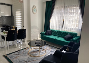 اطلالة مفتوحة - شقة غرفة وصالة جديدة -ضمن مجمع سكني - في محمودلار / الانيا 