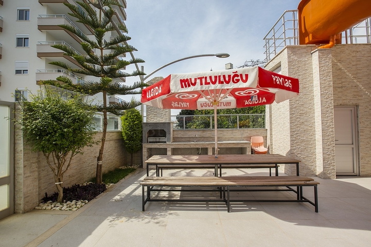 مجمع سكني انيق - شقة غرفتين وصالة مفروشة - في محمودلار / الانيا 