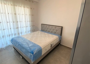 مجمع سكني حديث  - شقة غرفة وصالة - في محمودلار / الانيا 