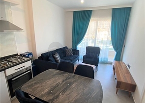 مجمع سكني حديث  - شقة غرفة وصالة - في محمودلار / الانيا 