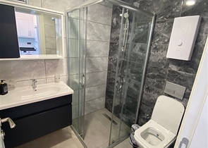 مجمع سكني حديث  - شقة غرفة وصالة - في محمودلار / الانيا 