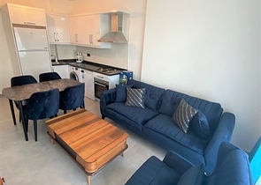 مجمع سكني حديث  - شقة غرفة وصالة - في محمودلار / الانيا 