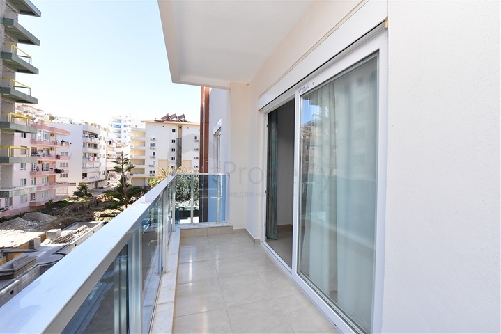 شقة انيقة - تصميم غرفتين وصالة مفروشة - قريبة من البحر والخدمات في محمودلار /الانيا 