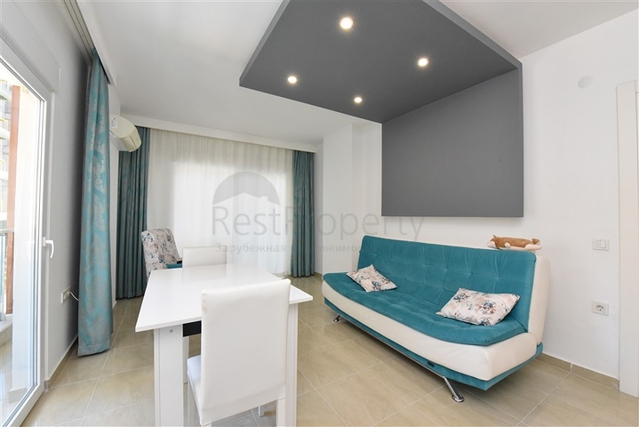 شقة انيقة - تصميم غرفتين وصالة مفروشة - قريبة من البحر والخدمات في محمودلار /الانيا 