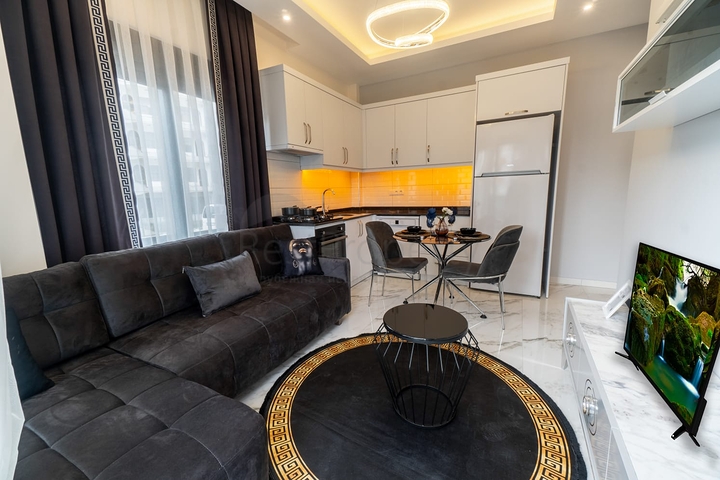 قريبة من البحر - شقة غرفة وصالة مفروشة - ضمن مجمع - في كاستل / الانيا 