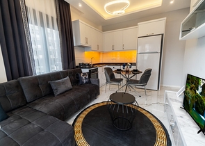 قريبة من البحر - شقة غرفة وصالة مفروشة - ضمن مجمع - في كاستل / الانيا 