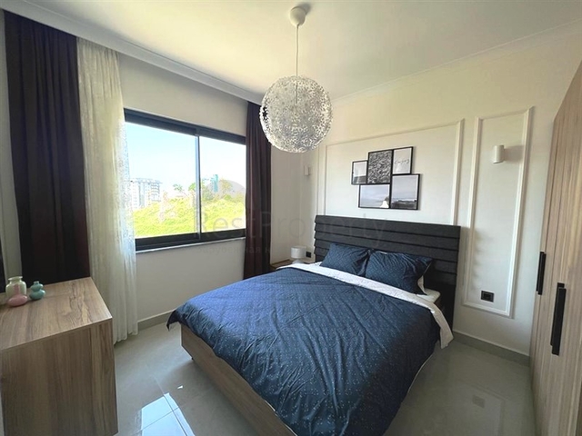 شقة جديدة  - غرفة وصالة مفروشة -ضمن مجمع - في محمودلار / الانيا 