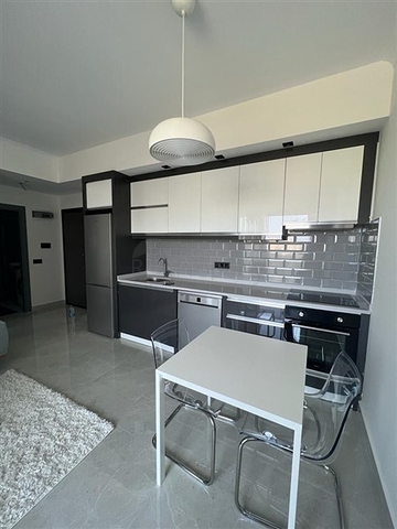 شقة جديدة  - غرفة وصالة مفروشة -ضمن مجمع - في محمودلار / الانيا 