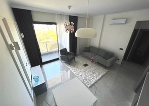 شقة جديدة  - غرفة وصالة مفروشة -ضمن مجمع - في محمودلار / الانيا 