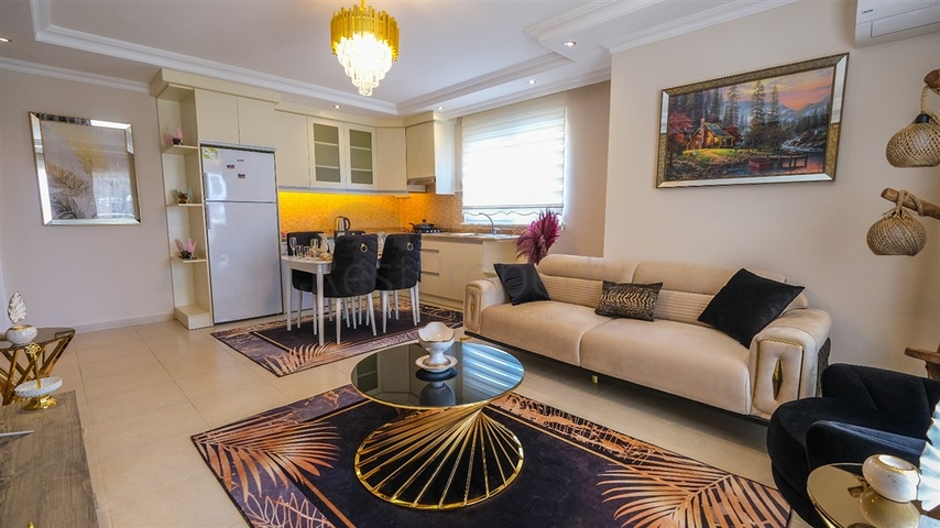 شقة غرفتين وصالة مفروشة - ضمن مجمع سكني -في محمودلار/ الانيا 