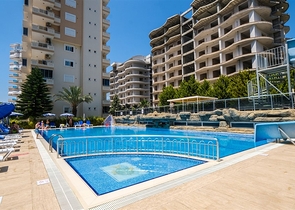 شقة غرفتين وصالة مفروشة - ضمن مجمع سكني -في محمودلار/ الانيا 