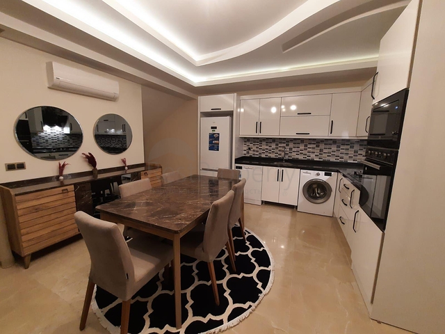 جانب المشفى الحكومي في الانيا - شقة 2 غرفة وصالة ضمن مجمع حديث في اوبا / الانيا 