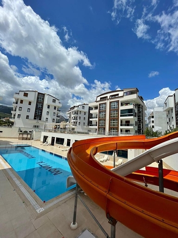 جانب المشفى الحكومي في الانيا - شقة 2 غرفة وصالة ضمن مجمع حديث في اوبا / الانيا 