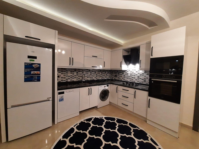 جانب المشفى الحكومي في الانيا - شقة 2 غرفة وصالة ضمن مجمع حديث في اوبا / الانيا 