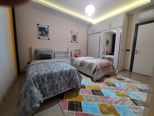 جانب المشفى الحكومي في الانيا - شقة 2 غرفة وصالة ضمن مجمع حديث في اوبا / الانيا 