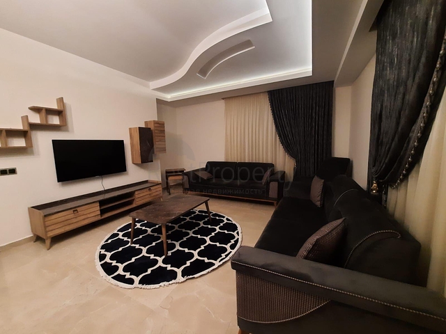 جانب المشفى الحكومي في الانيا - شقة 2 غرفة وصالة ضمن مجمع حديث في اوبا / الانيا 