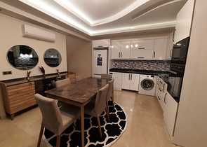 جانب المشفى الحكومي في الانيا - شقة 2 غرفة وصالة ضمن مجمع حديث في اوبا / الانيا 