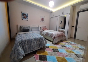 جانب المشفى الحكومي في الانيا - شقة 2 غرفة وصالة ضمن مجمع حديث في اوبا / الانيا 