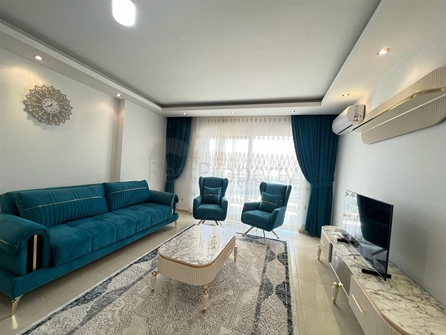 شقة غرفتين وصالة مفروشة - ضمن مجمع قريب من البحر والخدمات - في محمودلار / الانيا 