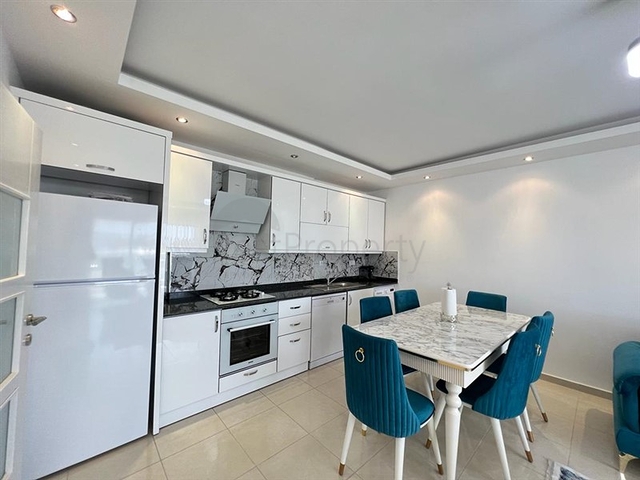 شقة غرفتين وصالة مفروشة - ضمن مجمع قريب من البحر والخدمات - في محمودلار / الانيا 