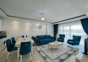 شقة غرفتين وصالة مفروشة - ضمن مجمع قريب من البحر والخدمات - في محمودلار / الانيا 