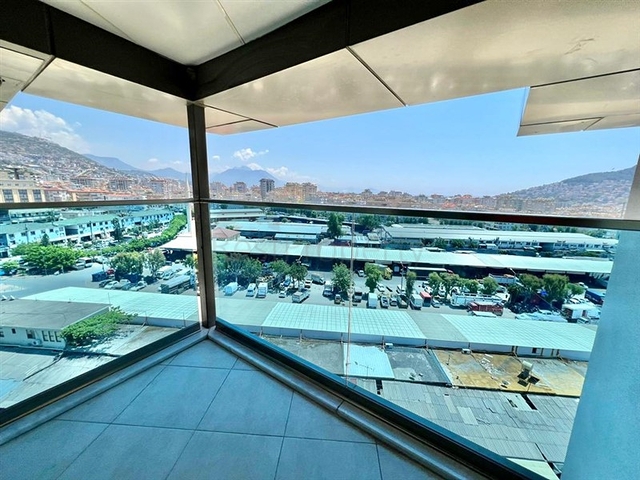 اطلالة بحر وقلعة  - دوبلكس غرفتين وصالة مفروشة -ضمن مجمع بخدمات فندقية - في مركز الانيا 