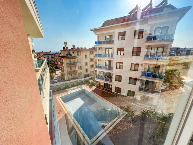 شقة غرفة وصالة - ضمن مجمع سكني - في منطقة كاستل الراقية / الانيا 