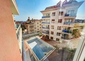 شقة غرفة وصالة - ضمن مجمع سكني - في منطقة كاستل الراقية / الانيا 