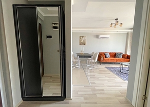 شقة غرفة وصالة مفروشة - ضمن مجمع سكني انيق - في محمودلار / الانيا 