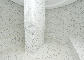 موقع مركزي - شقة غرفة وصالة مفروشة - ضمن مجمع سكني - في توسمور / الانيا 